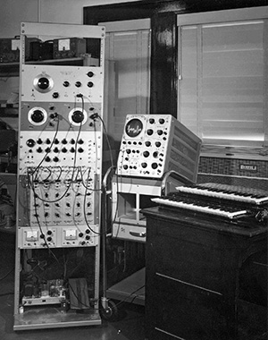 The Harmonic Tone Generator sits in an instrument rack with its keyboard to the right. This picture was taken in 1964. 